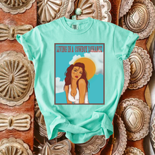 Load image into Gallery viewer, Living in a cowboy romance tee
